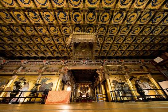 The gilded coffered ceiling and inner sanctuary of Honjido Hall